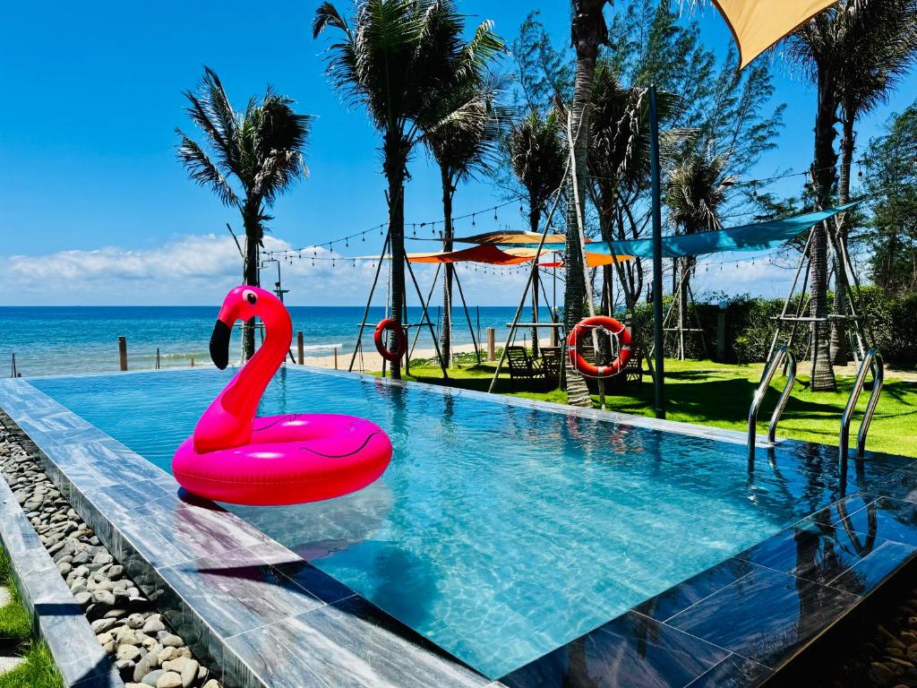 Whispering waves beachfront villa